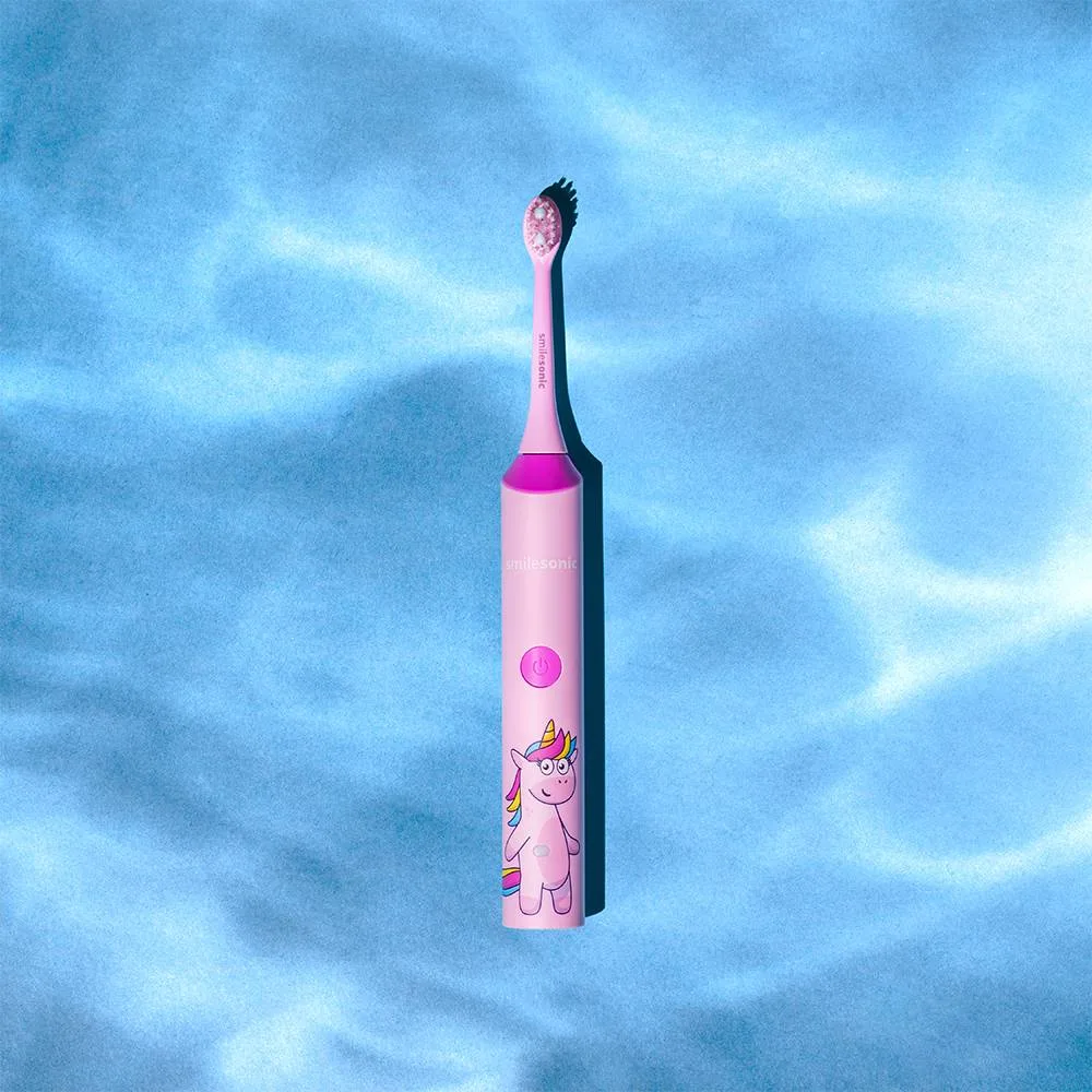 Smilesonic toothbrush KIDS in light reflected by water