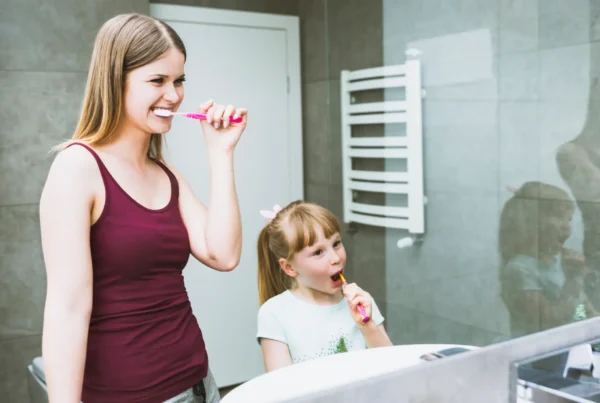 Family brushing teeth
