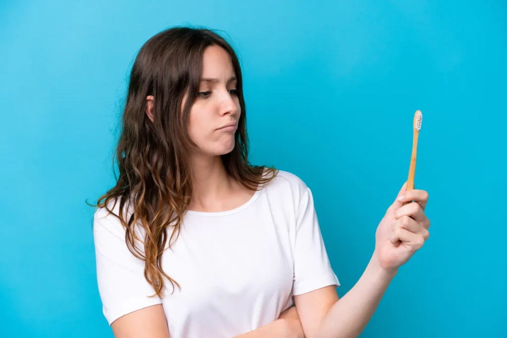 young-woman-brushing-teeth